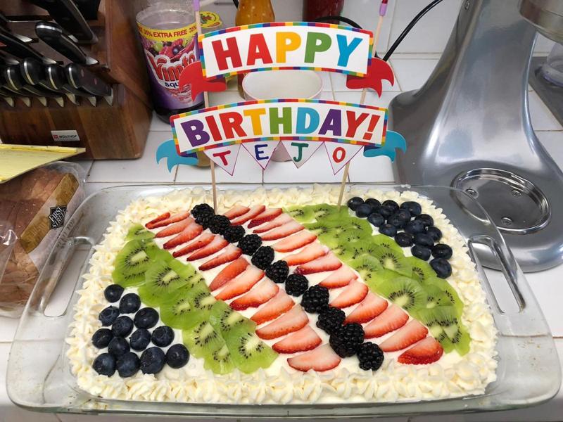 A fruit-topped celebration cake