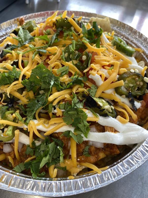 Loaded chaat with herbs and cheese
