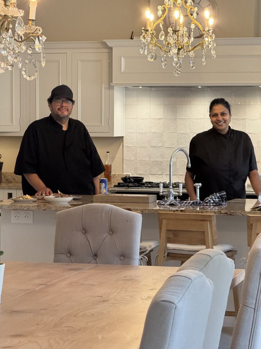 Chef Parag and Alpna handing back a spotless kitchen