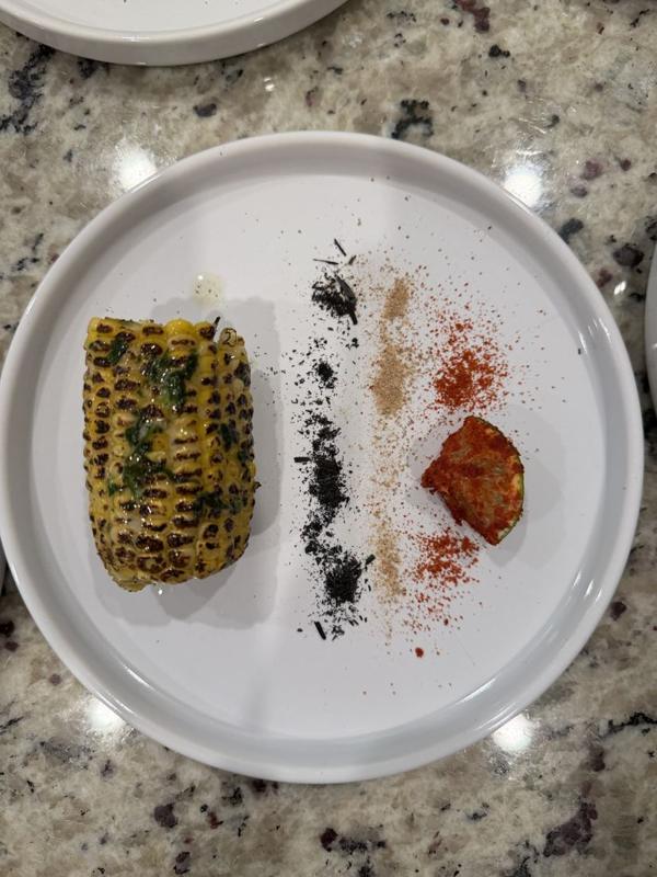 Charred corn tasting plate with spice dust