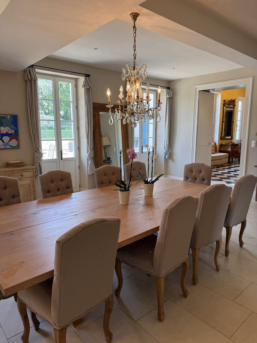 An intimate dinner party table set in a Houston home